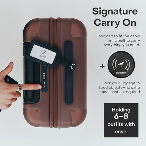 July Carry On with CaseSafe - 20" Built in Tracking, Airline Approved Carry On Luggage with Wheels, Travel Suitcase for Men & Women - Polycarbonate Shell, USB Ports & Ejectable Battery - Dark Brown