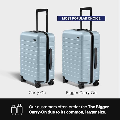 Away Amazon Exclusive Bigger Carry-On Luggage - 23-Inch Lightweight Hardside Suitcase with 360° Spinner Wheels, Interior Compression System, TSA-Approved Lock - Sky Blue