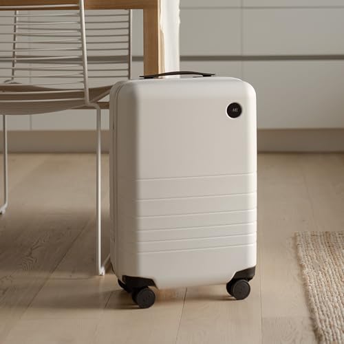 Monos Carry-On Luggage 22 Inch – Lightweight Hardside Spinner Suitcase with TSA Lock | Airline Approved, 39.9L Polycarbonate Rolling Carry On Bag | Overhead Bin Suitcase for Travel | Stellar White