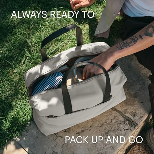 Away Amazon Exclusive The Everywhere Bag - Airline Approved Carry-On Bag with Padded Laptop Pocket, Detachable Shoulder Strap - Water-Repellent Carry-On Duffle Bag - Sky Blue